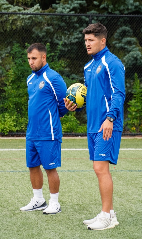 LCPerformance coaching staff on the pitch